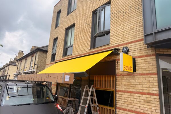 yellow savills commercial awning project